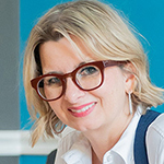 Dr. Maggie Augustyn, FAAIP, FICOI